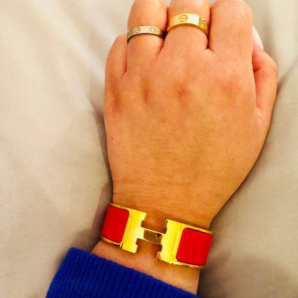 Authentic Hermes red and gold enamel clic clac